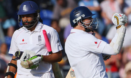 James Anderson celebrates securing the draw with Monty Panesar