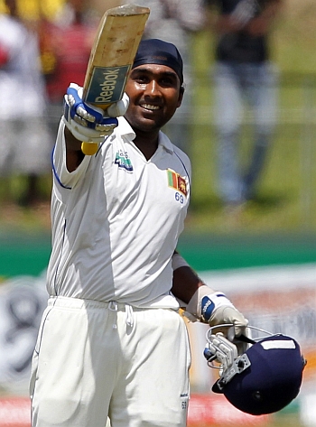 Sri Lanka's Jayawardene celebrates after scoring a century in Colombo