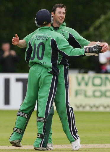 BELFAST, UNITED KINGDOM - JUNE 24: Alex Cusack (R) and Niall O'Brien of Ireland celebrate the wicket of Herschelle Gibbs of South Africa during the One Day International match between Ireland and South Africa at the Civil Service Cricket Club in Stormont on June 24, 2007 in Belfast, Northern Ireland. (Photo by Hamish Blair/Getty Images)